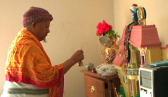 Bhutanese man praying