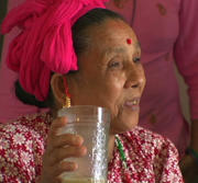 Video - Older woman talking with her family