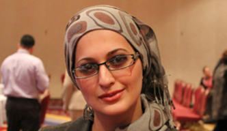 Iraqi speaker at a conference 296