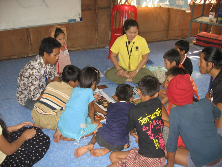 Children looking at images during child CO class