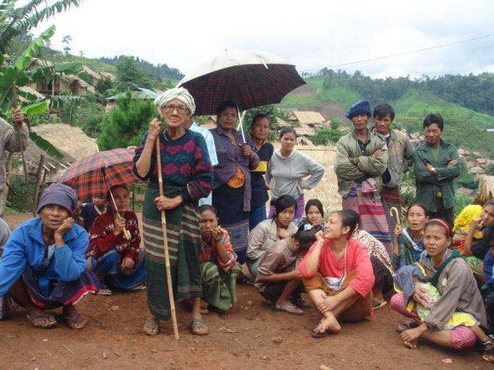 Outdoor question-and-answer session in Umpiem Camp