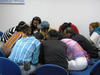 Group work: trying to stump competing group during Tic-Tac-Toe review game